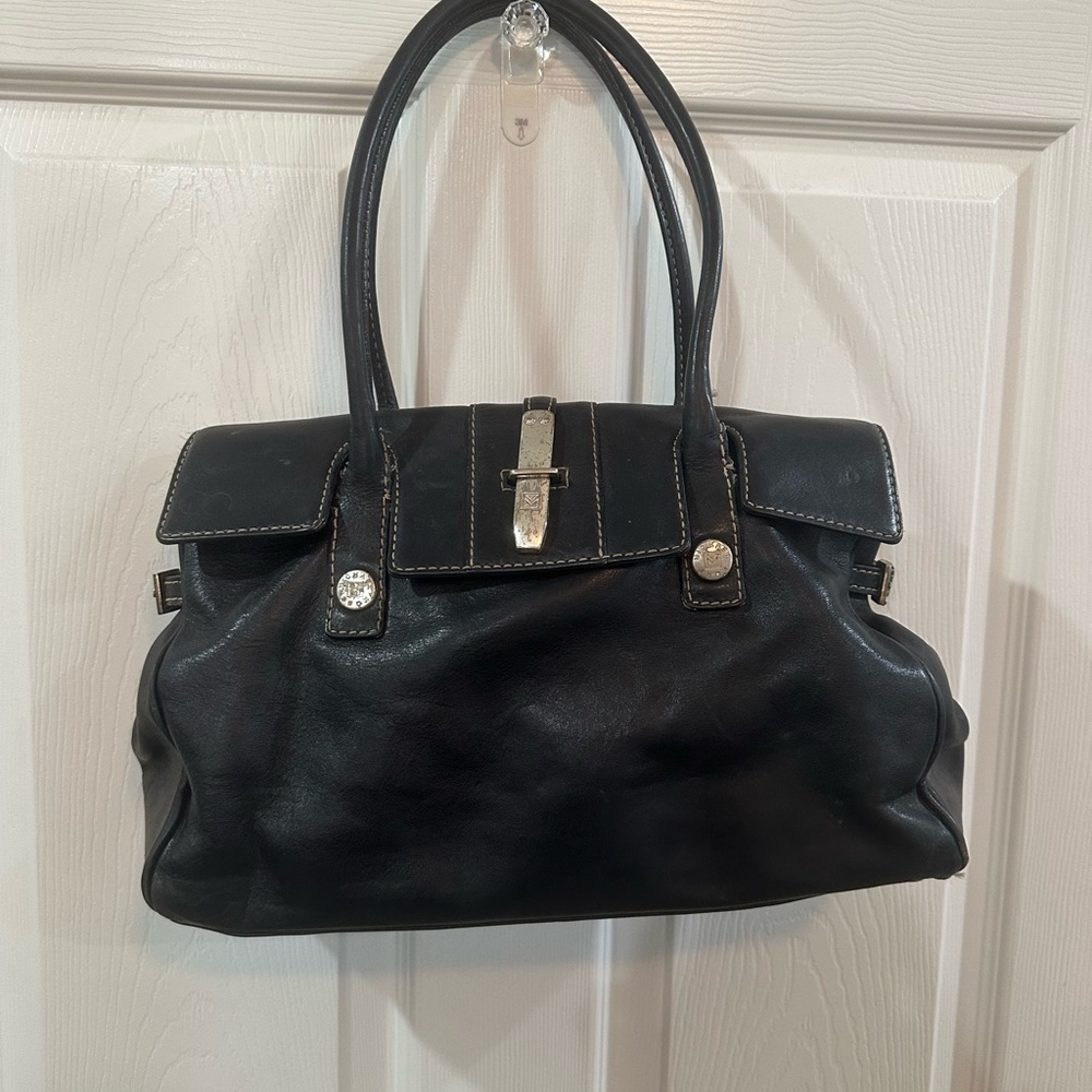 Very loved Michael Kors. Black leather satchel